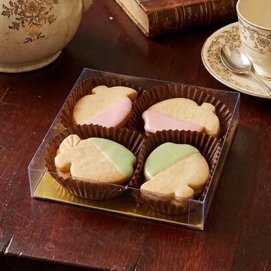 Tea set with shortbread cookies on a wooden table